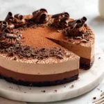 Slice of Chocolate Mousse Brownie Cake showing mousse and brownie layers