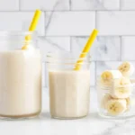 Creamy banana smoothie with milk, perfect for a healthy snack or breakfast.