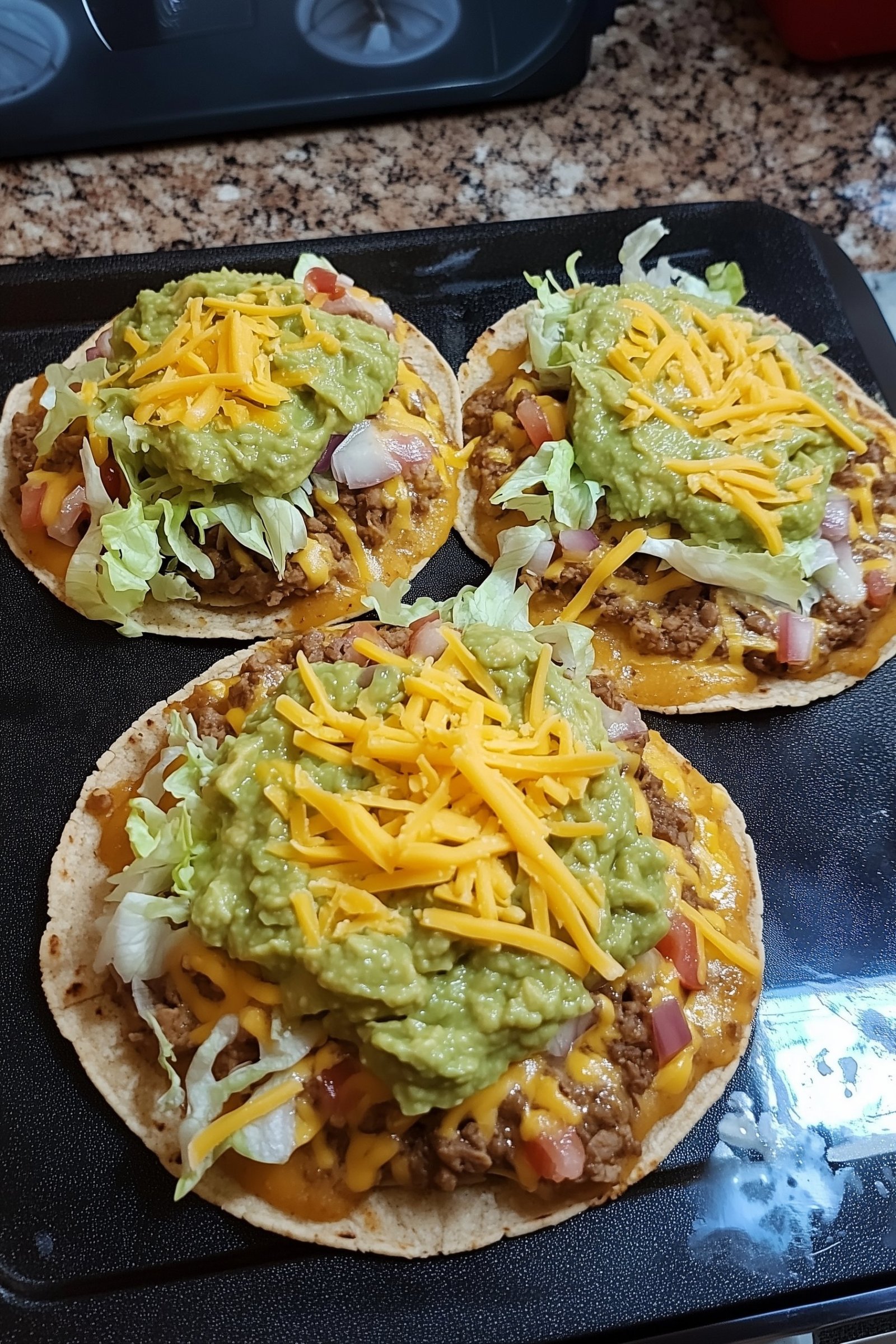 Bean Tostadas with Guacamole, Lettuce, Cheese, and Salsa