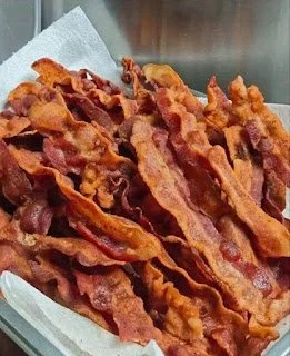 Crispy Baked Bacon on a baking sheet ready to serve