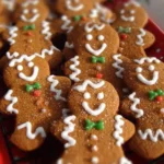 Plate of soft and chewy gingerbread men cookies decorated for the holidays