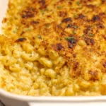 Southern baked macaroni and cheese recipe in a golden bubbly casserole dish