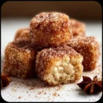 Homemade Vanilla Cinnamon Sugar Christmas Bites on a decorative plate