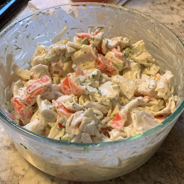 Delicious crab salad with fresh vegetables and zesty dressing