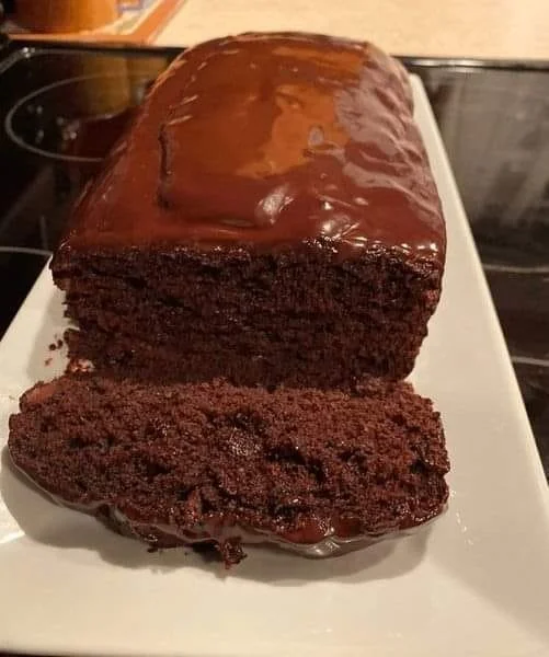Freshly baked hot fudge brownie bread topped with chocolate drizzle