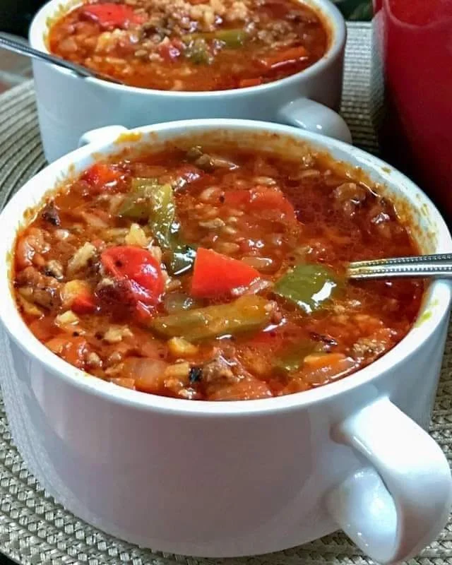 Sausage and beef rice casserole dish served hot in a bowl