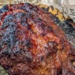 Delicious brown sugar meatloaf served with mashed potatoes and green beans.