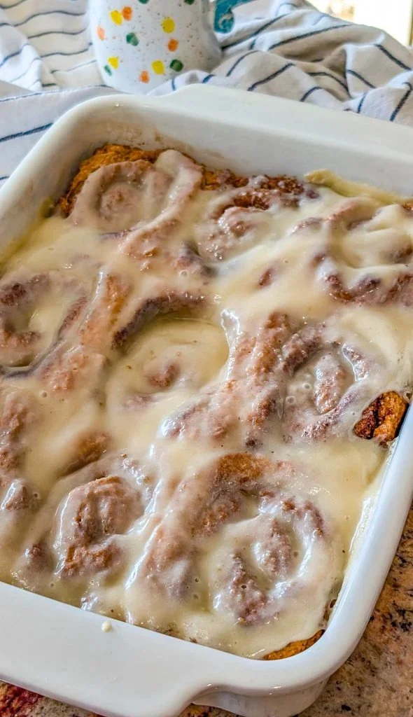 Delicious no yeast cinnamon rolls topped with icing on a plate