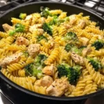 Delicious cheesy garlic chicken served with broccoli pasta